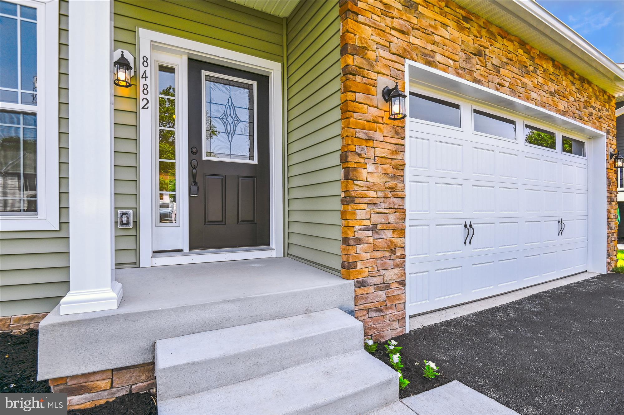 8482 Arbutus Road Pasadena, MD 21122 - Photo 5 of 63 Stone & Oversized Garage Door