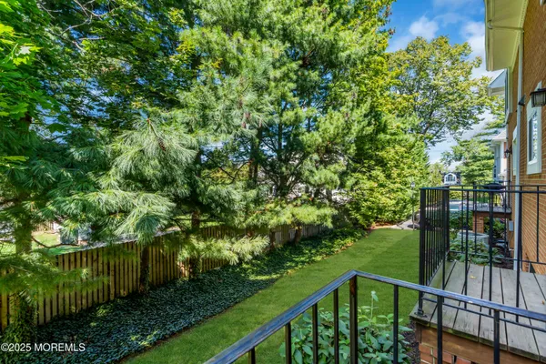 a view of a balcony with lake view