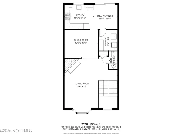 a picture of a bench in front of a wall