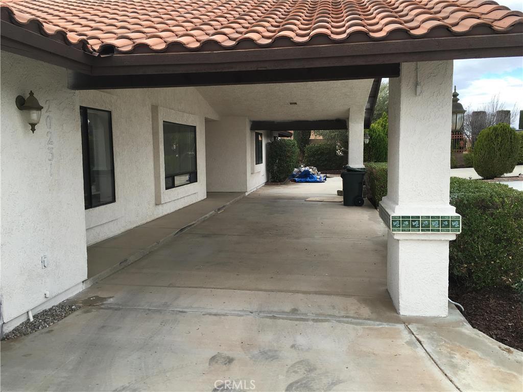 20231 Wadena Road Apple Valley, CA 92308 - Photo 2 of 20 a view of a house with a porch