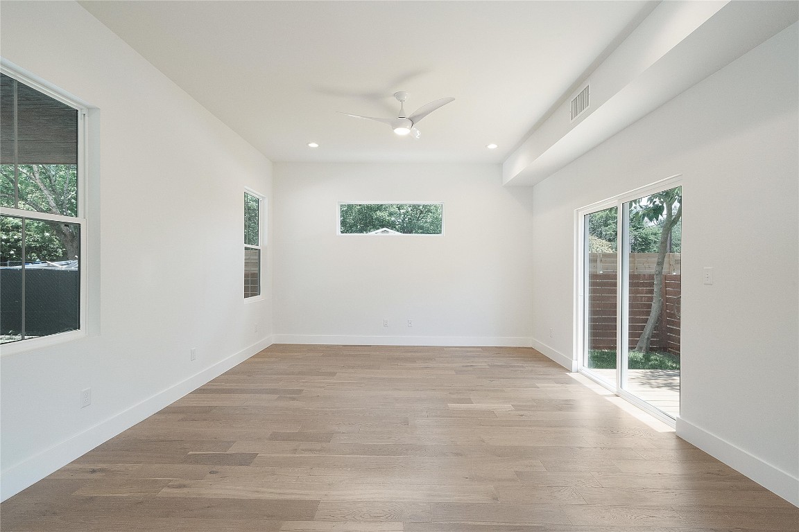 4805 Enchanted Lane, Unit 1 Austin, TX 78745 - Photo 12 of 29 an empty room with windows