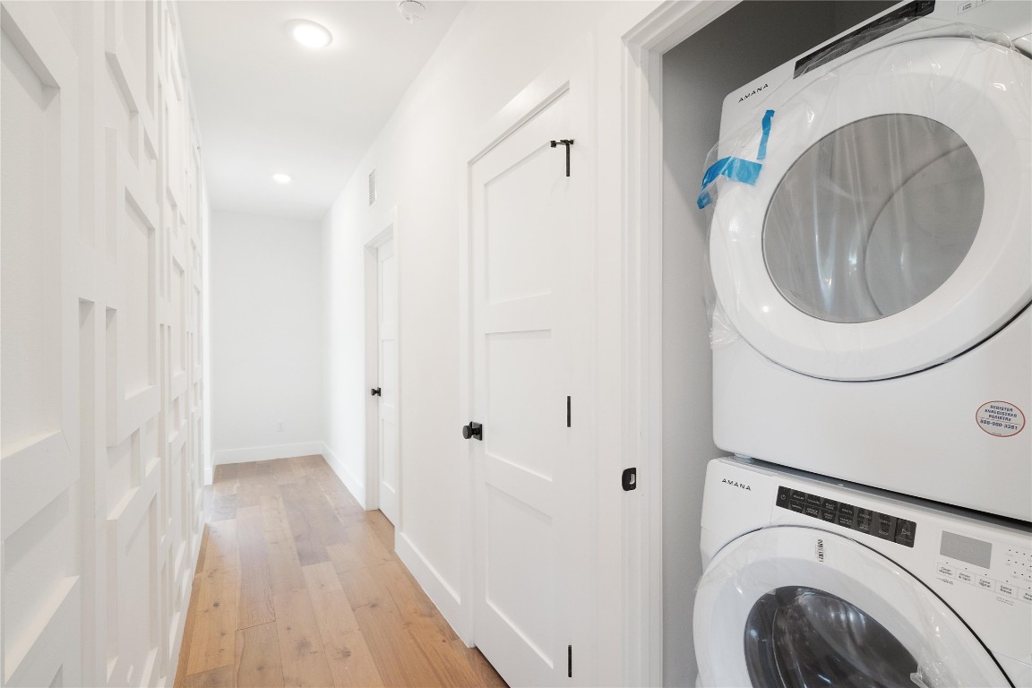 4805 Enchanted Lane, Unit 1 Austin, TX 78745 - Photo 21 of 29 a view of a hallway with washer and dryer
