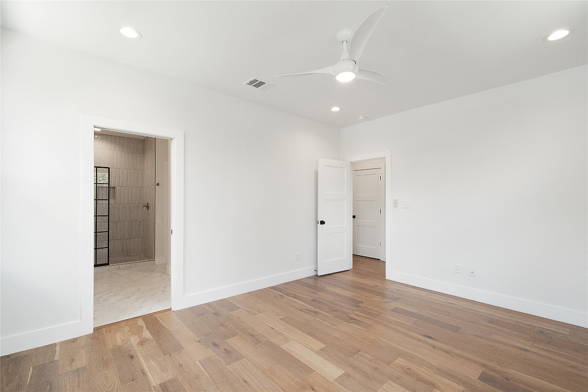 4805 Enchanted Lane, Unit 1 Austin, TX 78745 - Photo 23 of 29 wooden floor in an empty room
