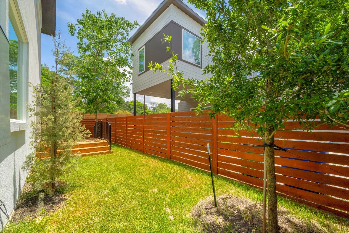 4805 Enchanted Lane, Unit 1 Austin, TX 78745 - Photo 6 of 29 a view of a house with a small yard