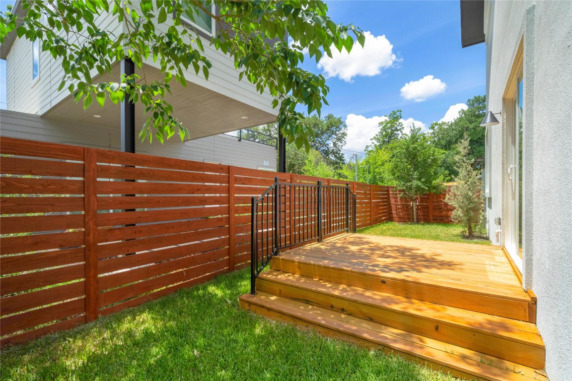 4805 Enchanted Lane, Unit 1 Austin, TX 78745 - Photo 7 of 29 Fenced backyard featuring a deck