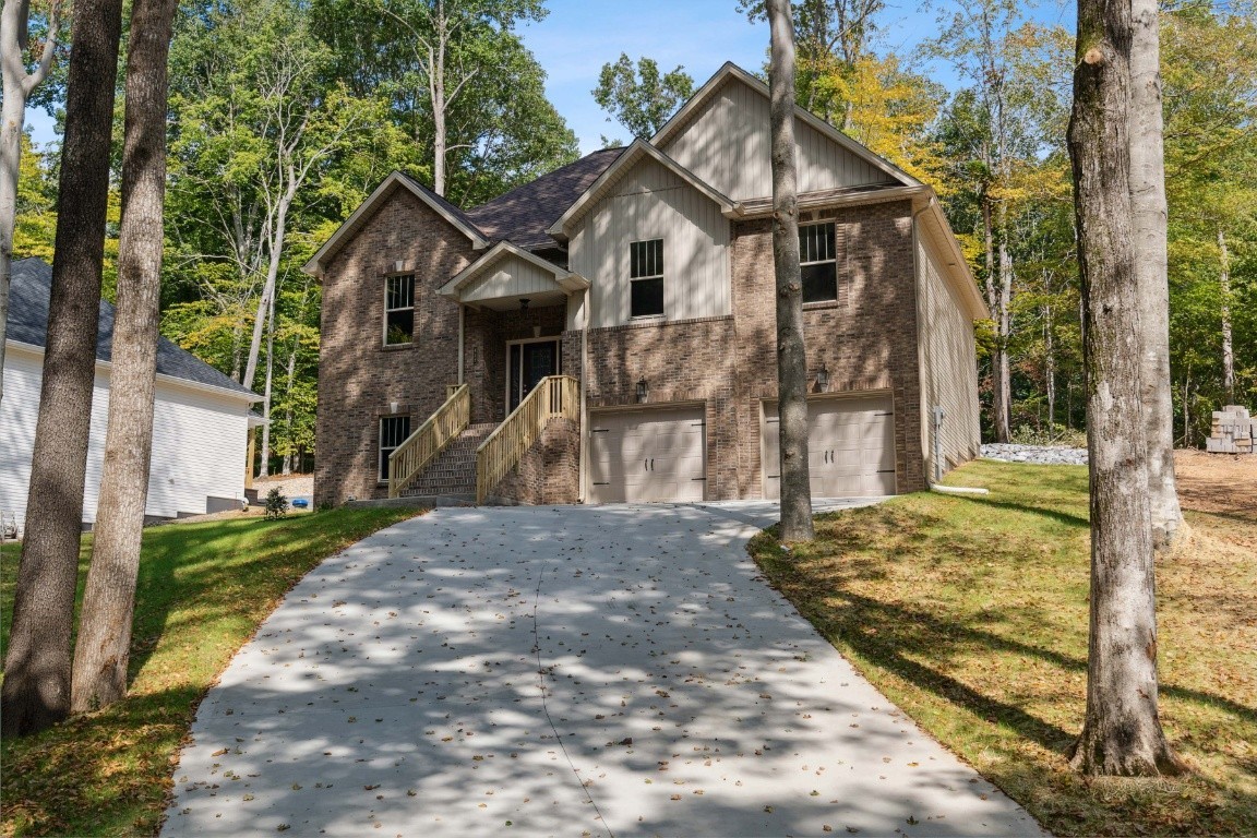 427 Jen Hollow Road Clarksville, TN 37040 - Photo 2 of 36 a front view of a house with a yard