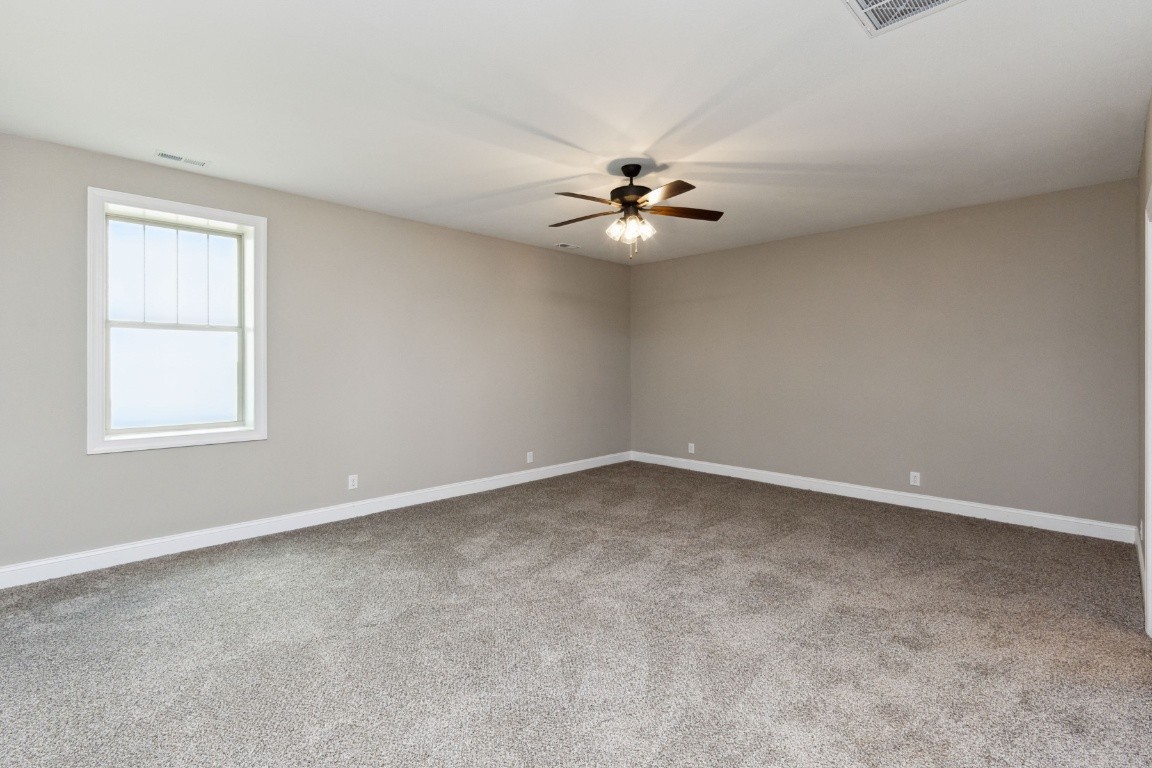 427 Jen Hollow Road Clarksville, TN 37040 - Photo 25 of 36 an empty room with a window and a fan
