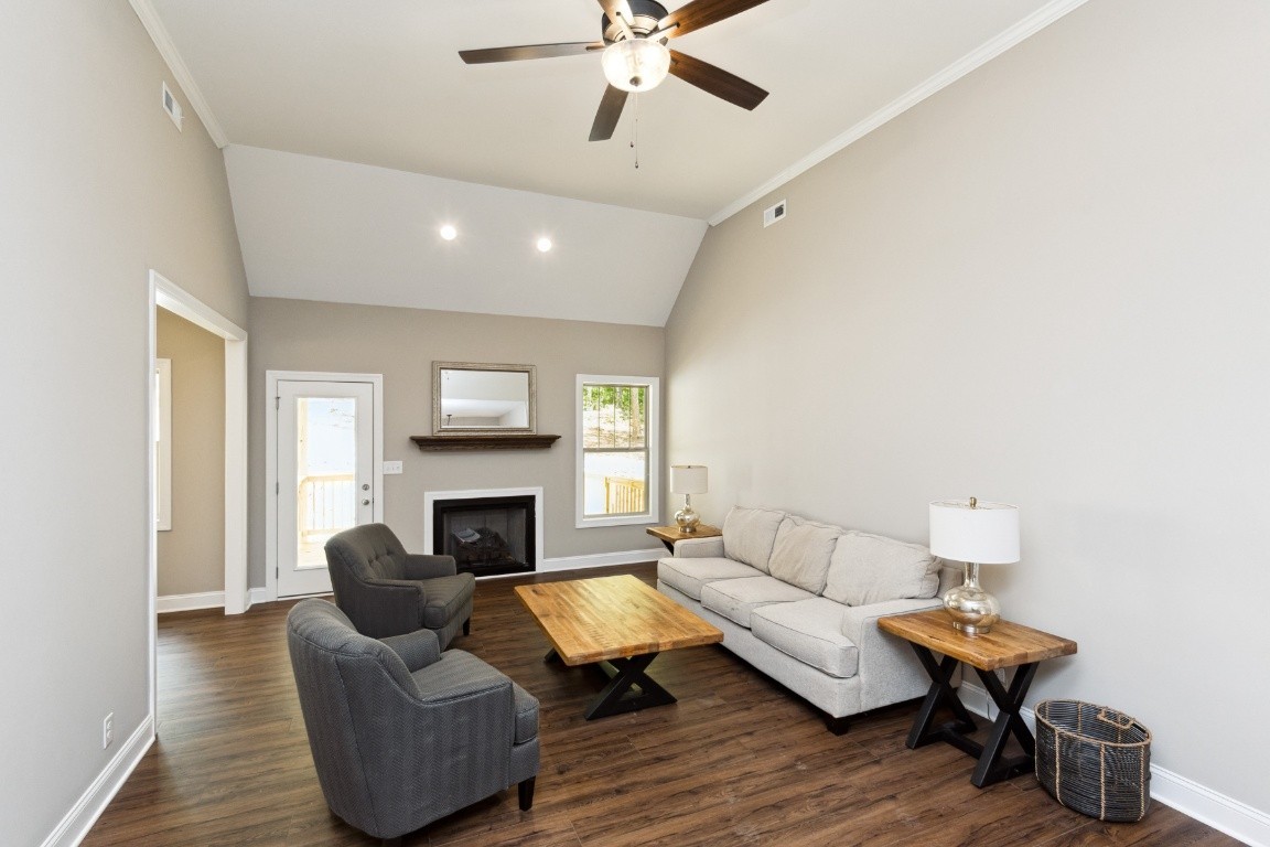 427 Jen Hollow Road Clarksville, TN 37040 - Photo 5 of 36 a living room with furniture and a fireplace