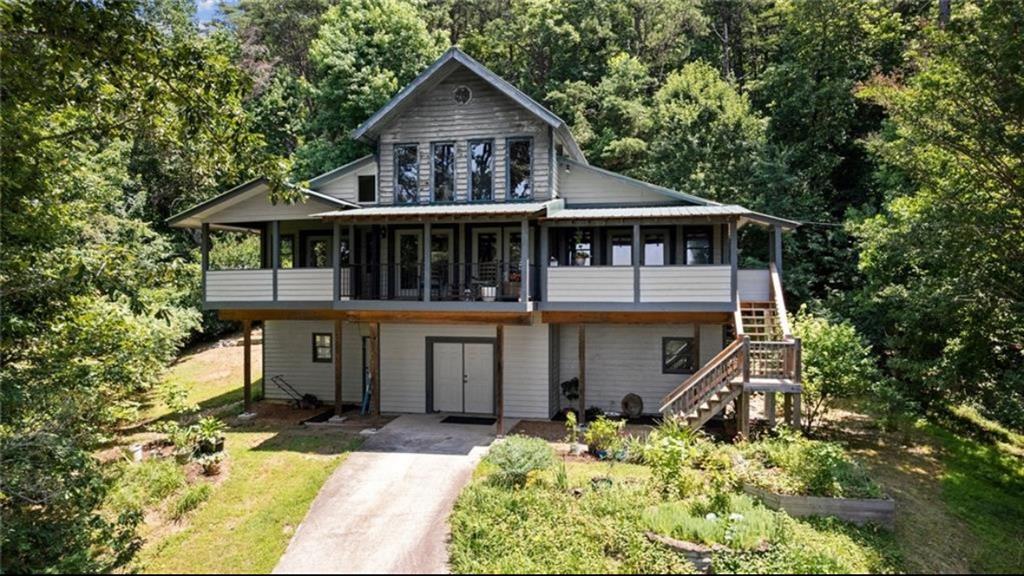339 Cameron Road Cleveland, GA 30528 - Photo 1 of 36 front view of a house with a yard