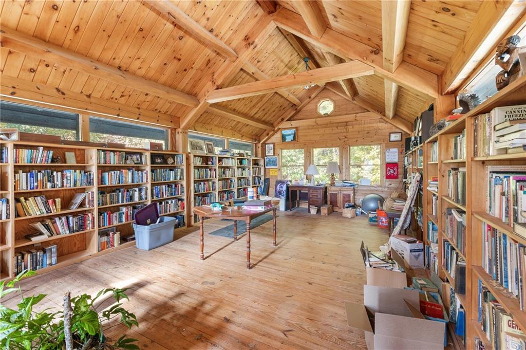 339 Cameron Road Cleveland, GA 30528 - Photo 16 of 36 a view of living room with furniture and book shelf