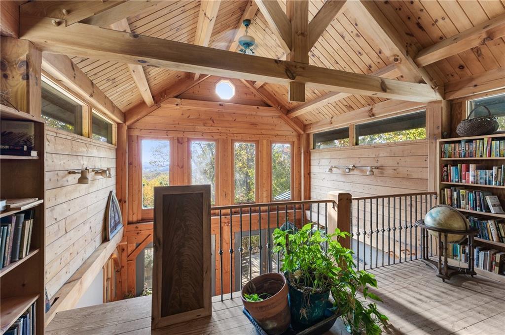 339 Cameron Road Cleveland, GA 30528 - Photo 17 of 36 a view of a chairs and bench in the balcony