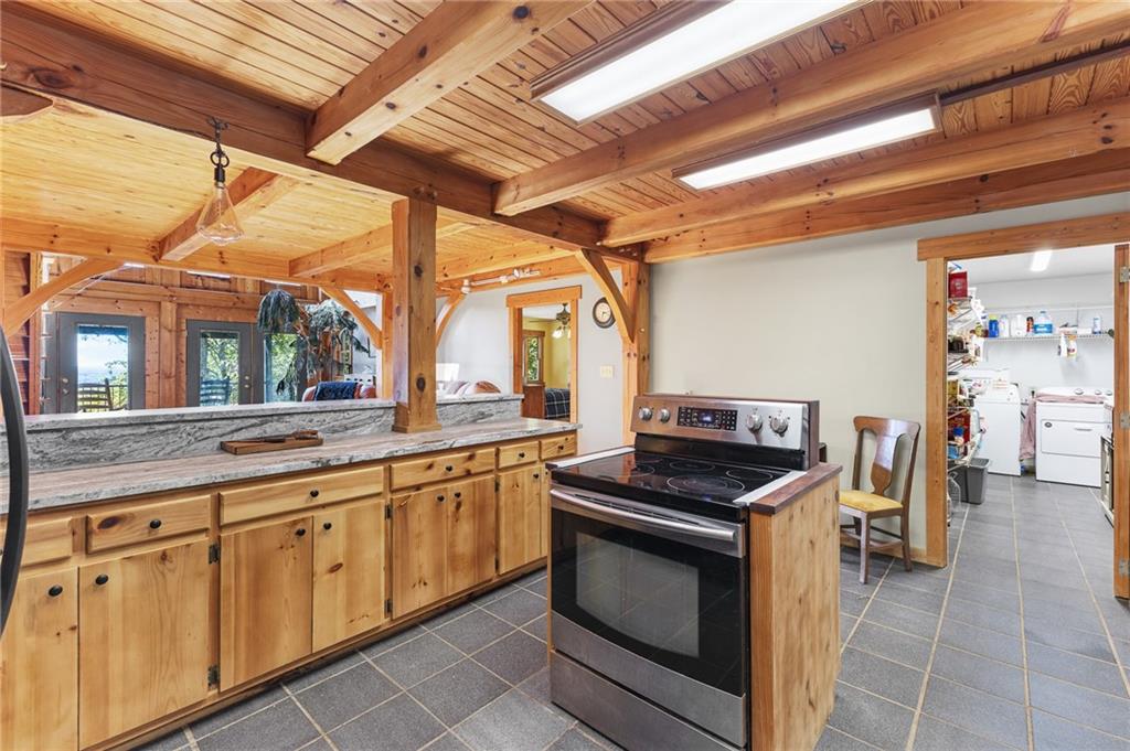 339 Cameron Road Cleveland, GA 30528 - Photo 21 of 36 a kitchen that has a stove and a sink