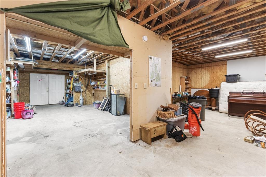 339 Cameron Road Cleveland, GA 30528 - Photo 32 of 36 a view of a garage with parked cars