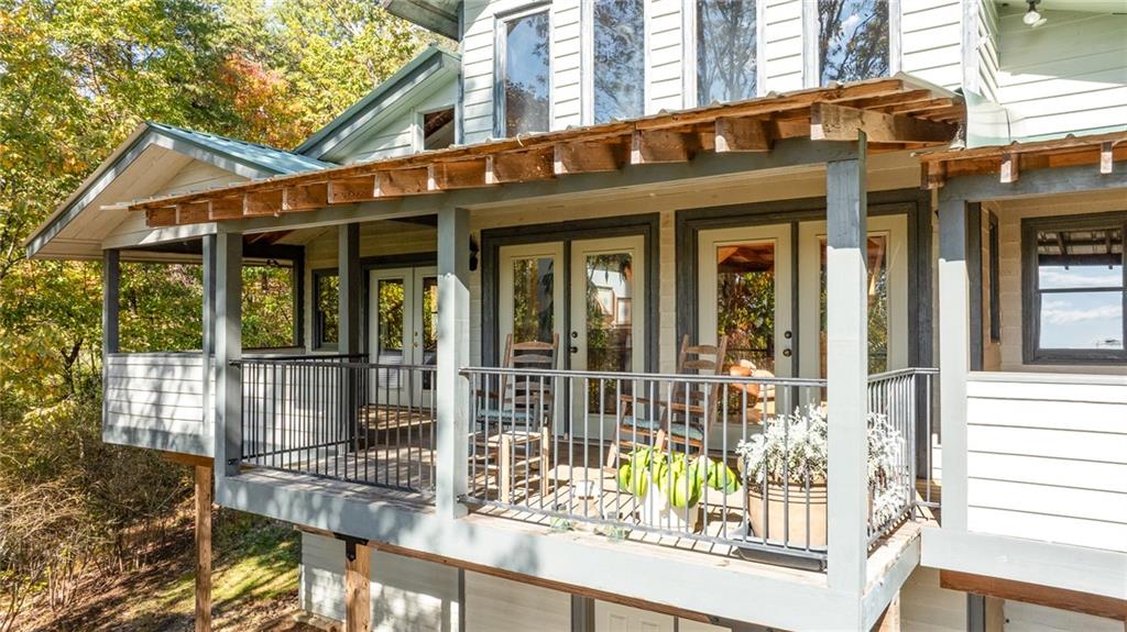 339 Cameron Road Cleveland, GA 30528 - Photo 9 of 36 a view of a building with a large window