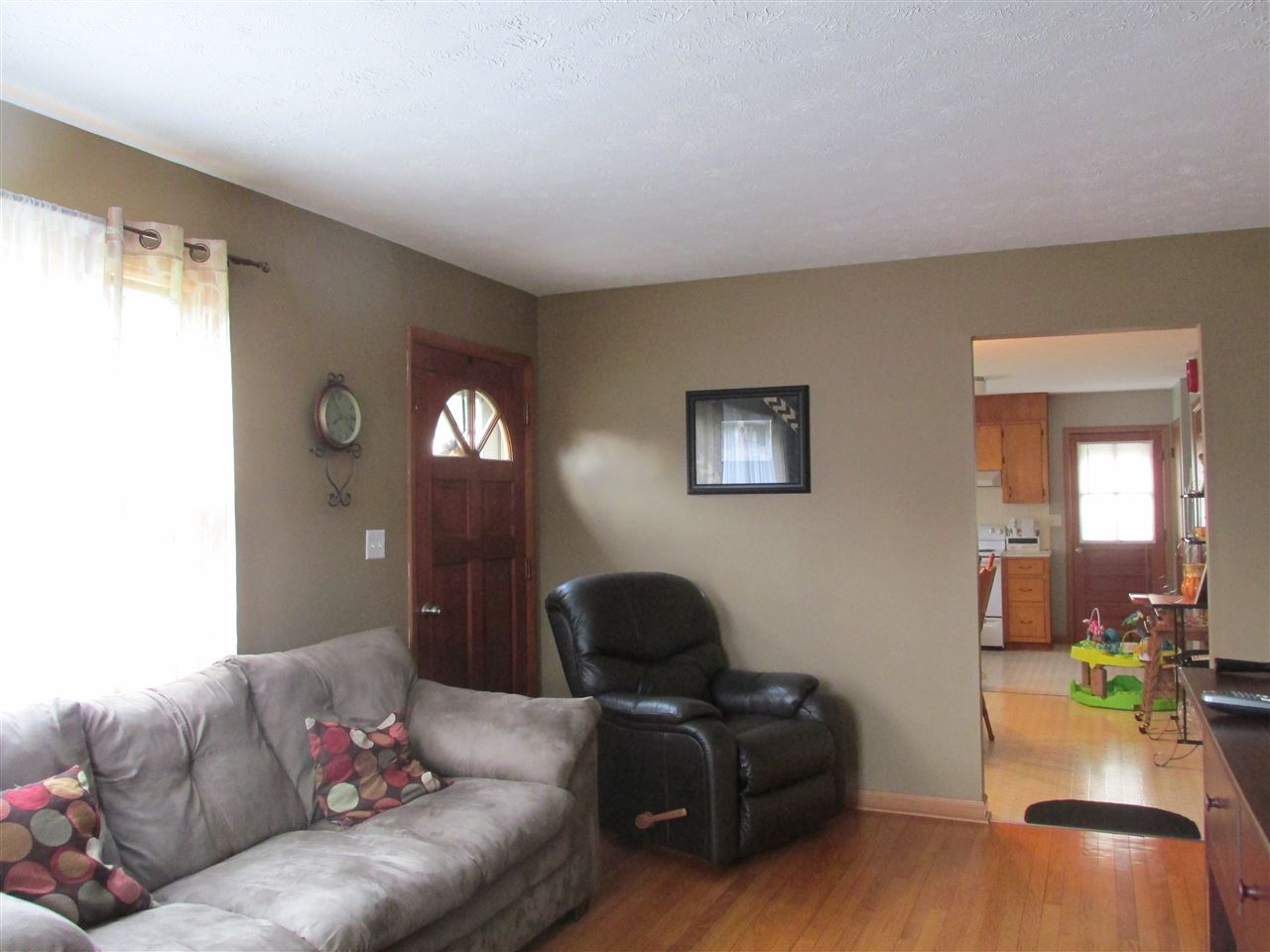 318 Locust Lane Ruckersville, VA 22968 - Photo 3 of 8 a living room with furniture and a mirror