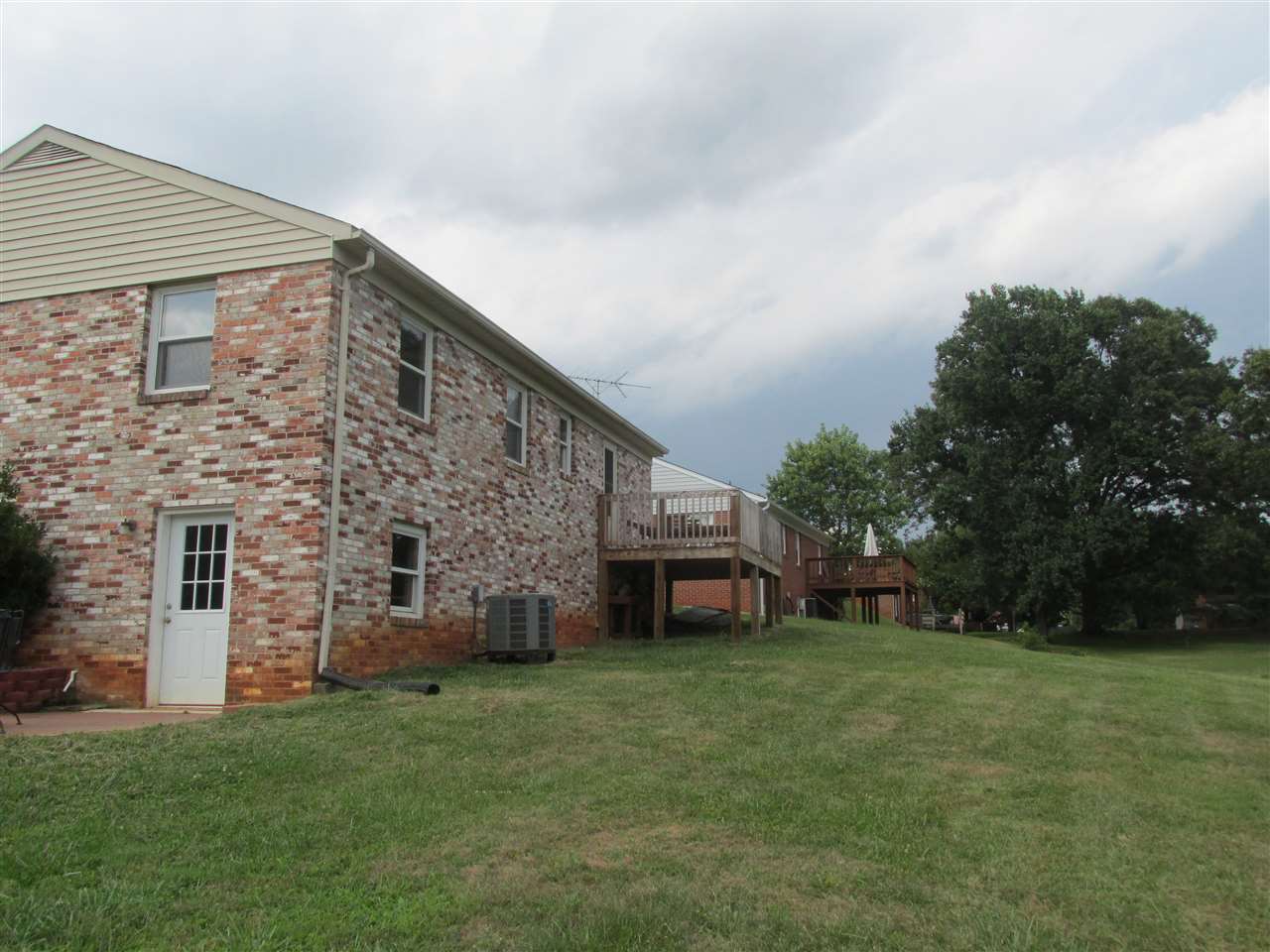 318 Locust Lane Ruckersville, VA 22968 - Photo 6 of 8 a view of a house with a backyard