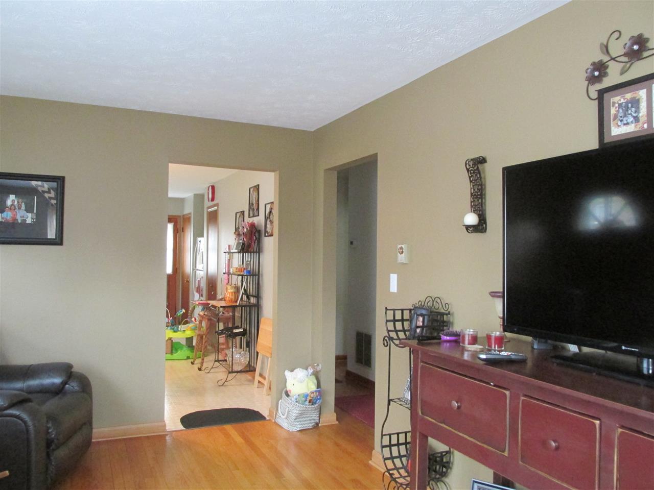 318 Locust Lane Ruckersville, VA 22968 - Photo 7 of 8 a living room with furniture and a flat screen tv