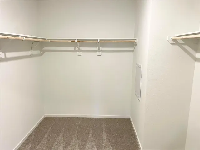 a view of a room with racks on the wall