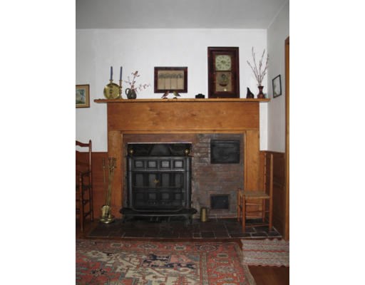 40 Chestnut Hill Road Orange, MA 01364 - Photo 13 of 22 a living room with furniture and a fireplace