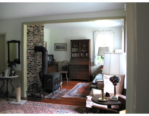 40 Chestnut Hill Road Orange, MA 01364 - Photo 21 of 22 a living room with furniture and a flat screen tv