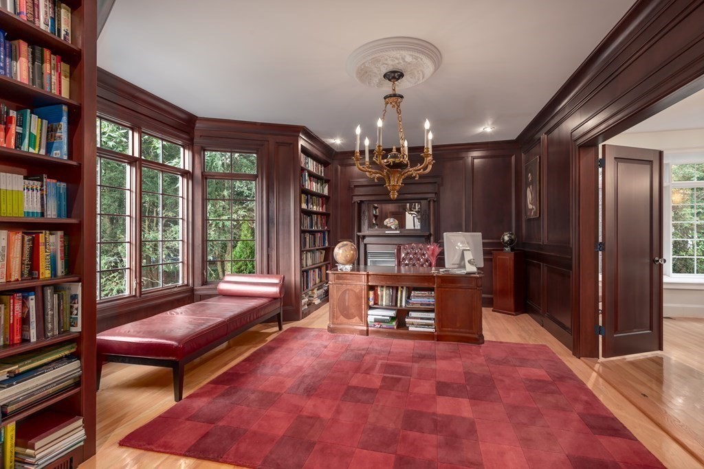 83 Winston Road Newton, MA 02459 - Photo 5 of 24 a view of a room with furniture and a book shelf