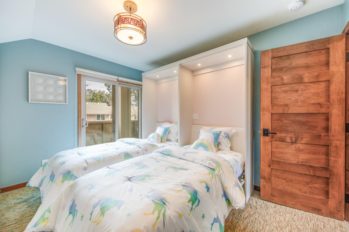 22832 Longdown Road Cupertino, CA 95014 - Photo 27 of 41 a bedroom with a bed and a window