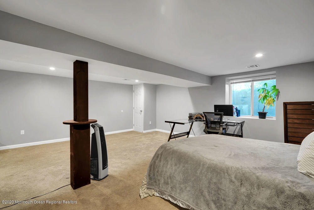 4 Nolan Road Morganville, NJ 07751 - Photo 20 of 46 a bedroom with furniture and a window