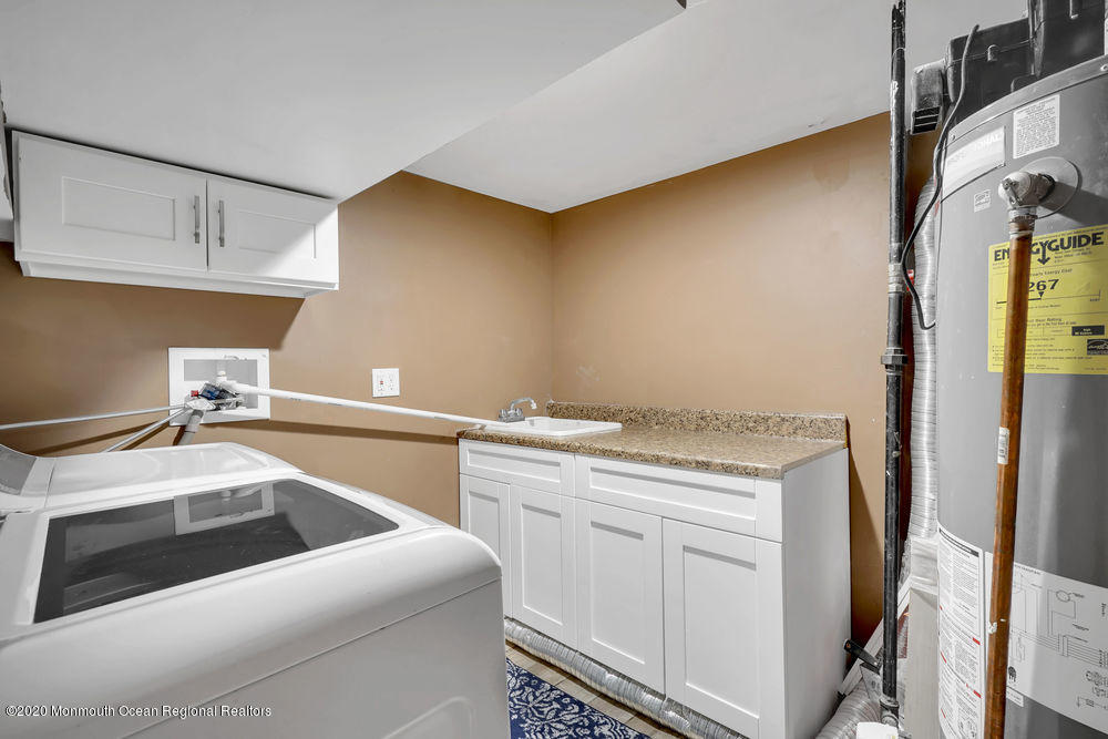 4 Nolan Road Morganville, NJ 07751 - Photo 24 of 46 a utility room with dryer and washer