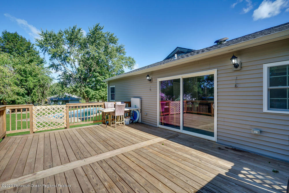 4 Nolan Road Morganville, NJ 07751 - Photo 36 of 46 a view of a roof deck