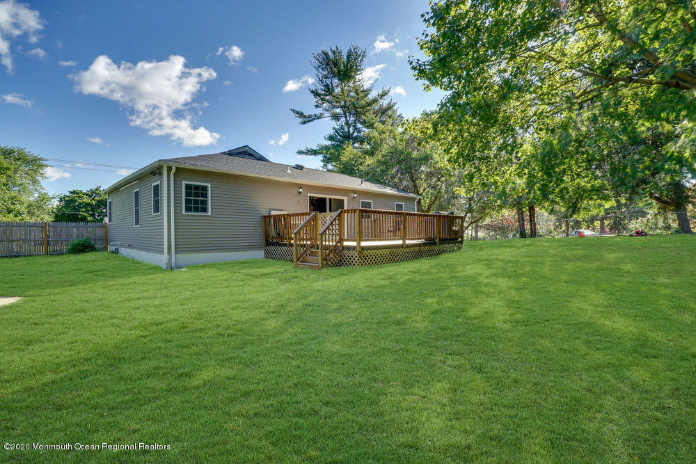 4 Nolan Road Morganville, NJ 07751 - Photo 40 of 46 a front view of a house with garden