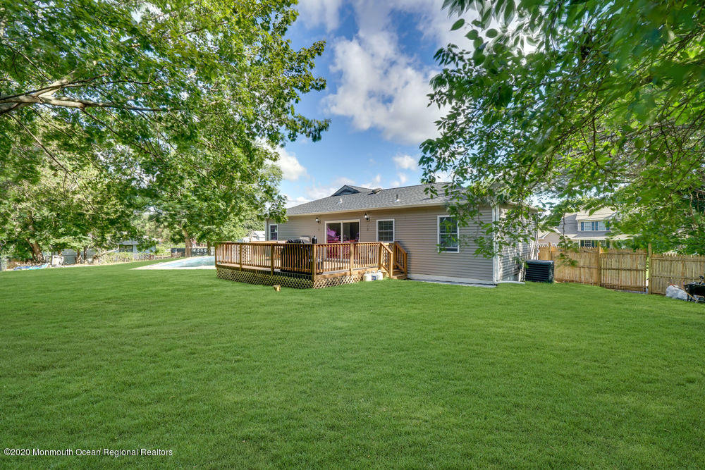 4 Nolan Road Morganville, NJ 07751 - Photo 42 of 46 a front view of a house with a garden