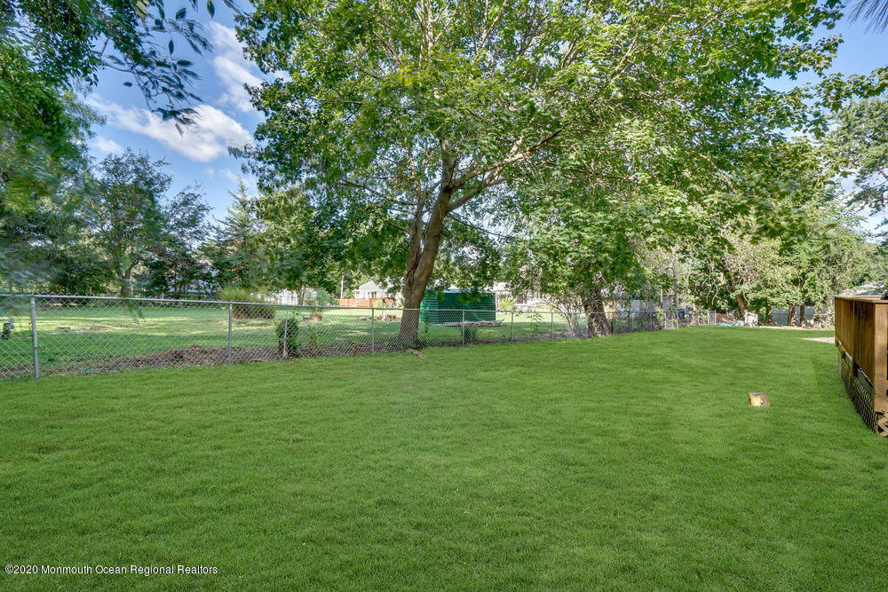 4 Nolan Road Morganville, NJ 07751 - Photo 43 of 46 a view of a park with large trees