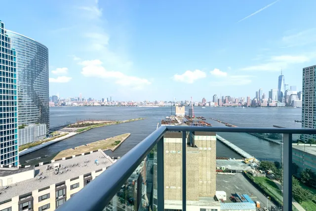a view of a balcony with city view