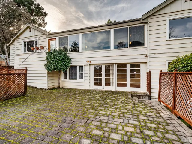 a view of a house with a patio