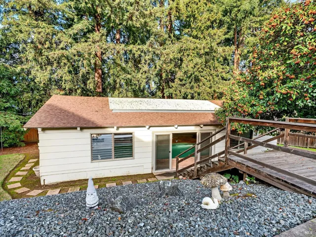 a view of a swimming pool with a outdoor seating