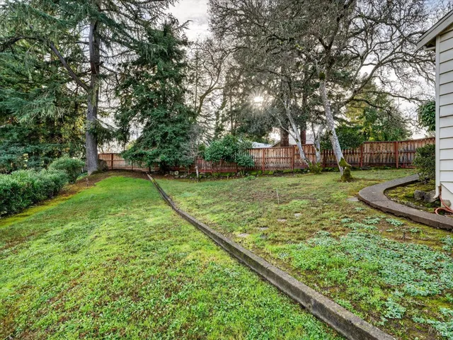 a view of a backyard with garden
