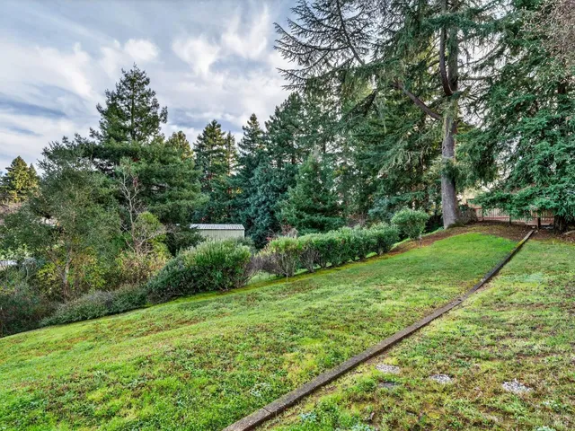 a backyard of a house with seating space