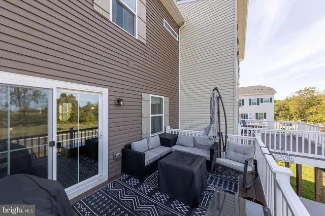 a view of a balcony with couch