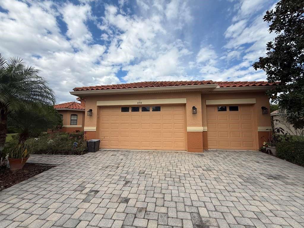 898 San Raphael Street Poinciana, FL 34759 - Photo 26 of 37 a house with a outdoor space