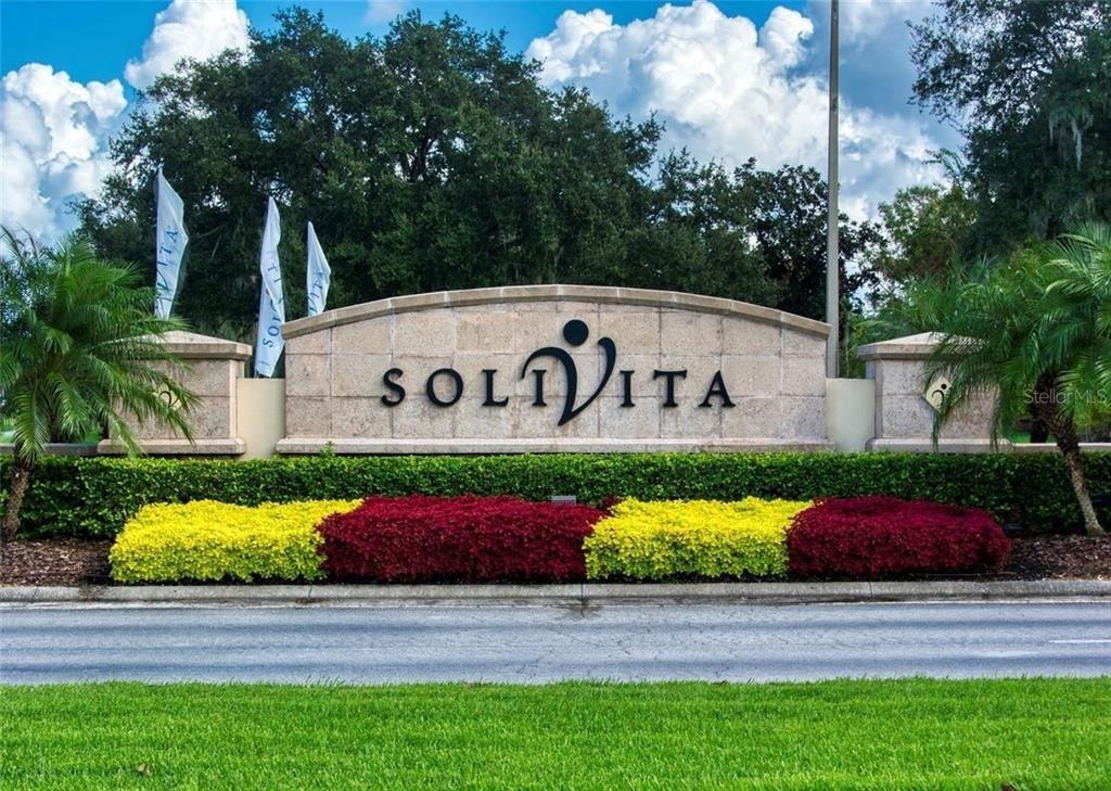 898 San Raphael Street Poinciana, FL 34759 - Photo 30 of 37 a view of a sign board with yard