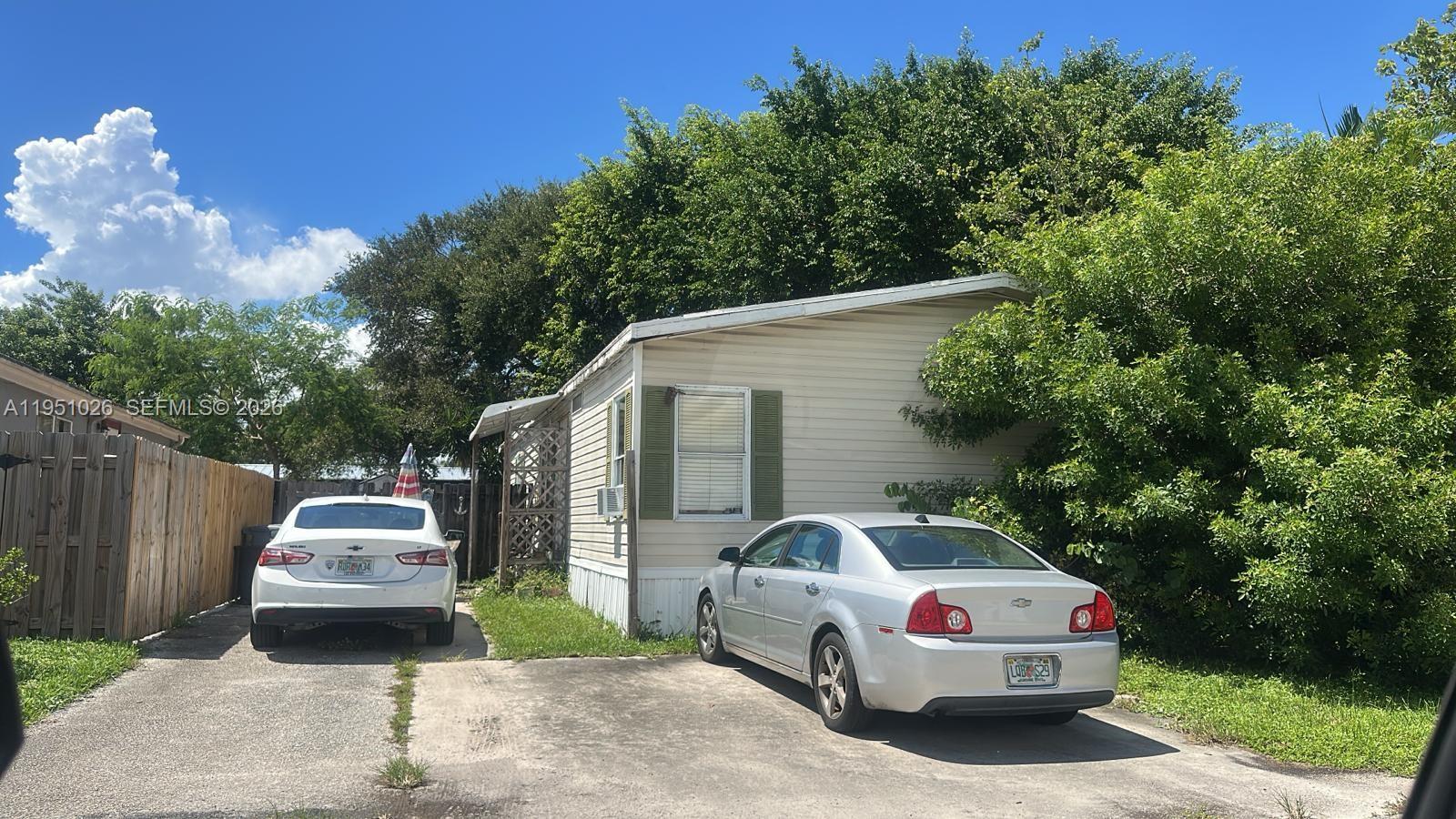a car parked in front of a house