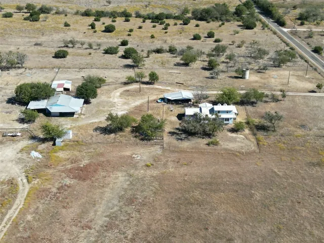 a view of swimming pool with green space