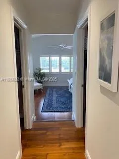 a view of entryway with wooden floor