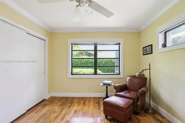 a view of a wooden door and a bench in a yard