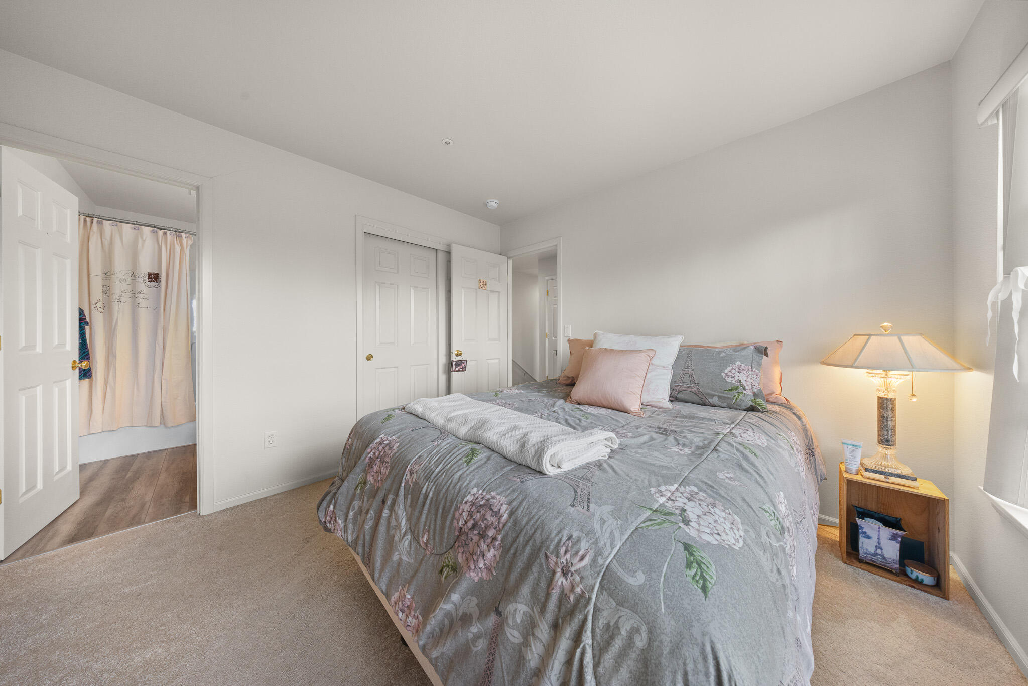624 Southwest Hill Street Bend, OR 97702 - Photo 33 of 45 a bed sitting in a bedroom and table