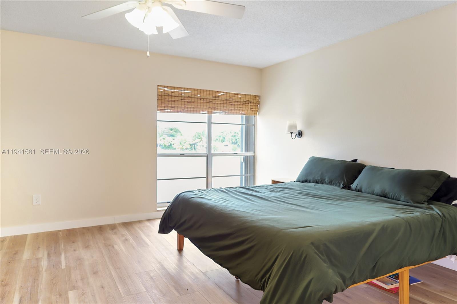 14009 Southwest 84th Street Miami, FL 33183 - Photo 10 of 15 a bedroom with a bed and a window