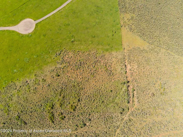 a view of a bathroom with shower