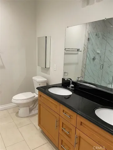 a bathroom with bathtub and a shower