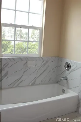 a bathroom with a sink and a shower