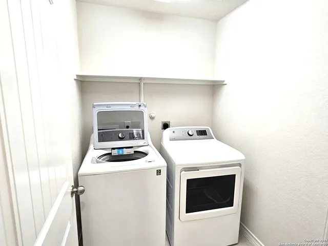 a view of swimming pool with outdoor seating
